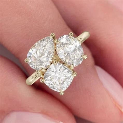stone toi  moi ring  tcw pear oval cushion cut wedding