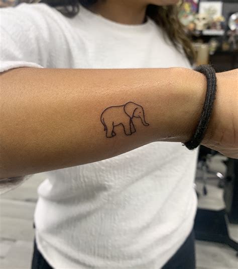 elephant symbol tattoo