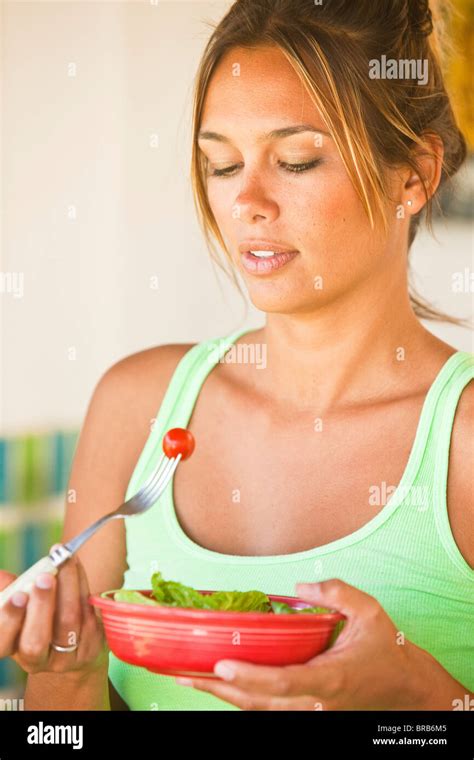 woman eating healthy food Stock Photo - Alamy