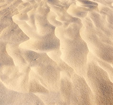 Premium Photo | Sand art natural sand art at the beach