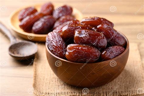 Date Palm Fruit (MedJool) in Wooden Bowl Stock Image - Image of energy ...