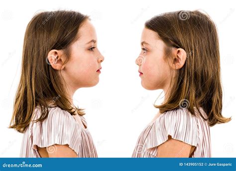 identical twin girls       smiling stock photo