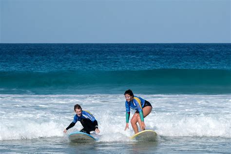 surf lessons junior surf camp spain planet surf teaches   spain