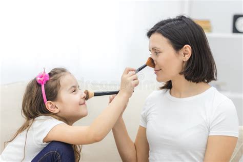 Photo of Mother and Daughter Relationship, Doing Make Up. Stock Image ...