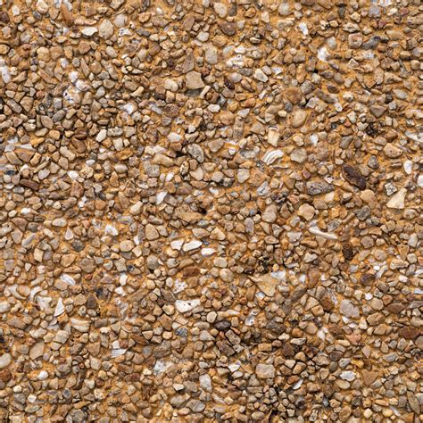 The pattern small brown pebbles stone as background. pebbles texture ...