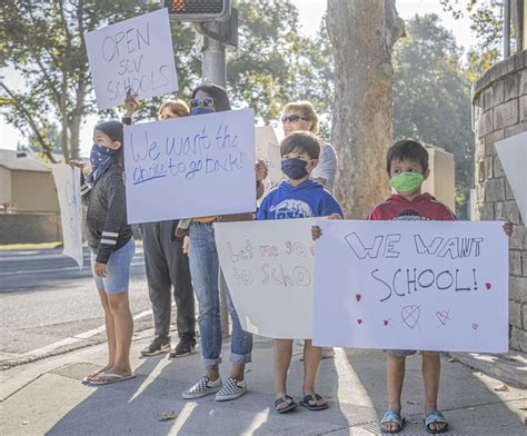 Parents gather to protest distance learning, want schools to reopen