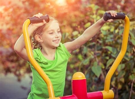 Young girl with simulator stock image. Image of athlete - 216704329