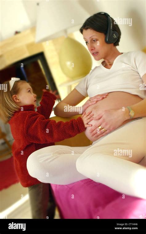 PREGNANT WOMAN & CHILD Stock Photo - Alamy