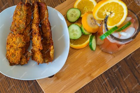 Premium Photo | Cold nigerian chapman cocktail served with suya ...
