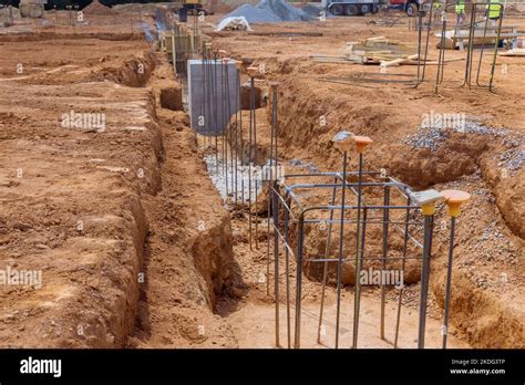 Trench for concrete foundation is reinforced with steel bars rebar ...