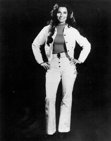 Young Loretta Lynn's Candid Moments Captured in Heartwarming Photos