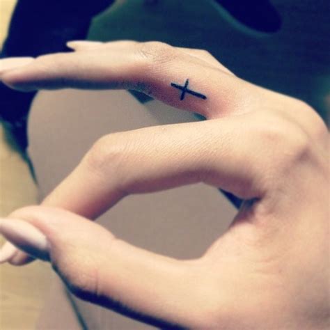 Harry Styles Cross Tattoo