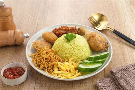 nasi kuning indonesian traditional food   rice cooked
