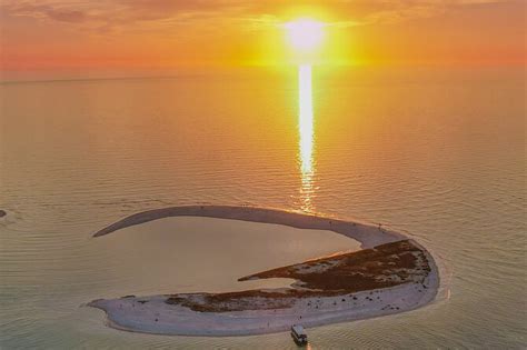 st pete dolphin watching  island sunset cruise power traveller
