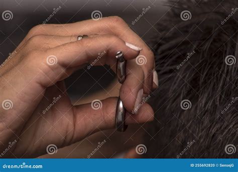 A Woman Hair Stylist Cuts the Hair on the Male Head . Stock Photo ...