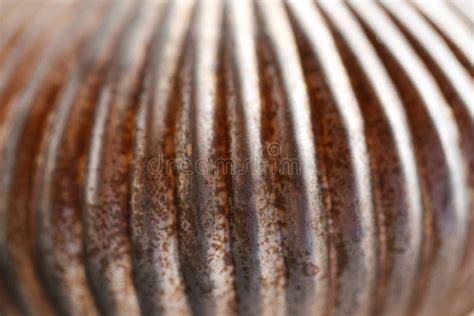 ribbed metal rusty surfaceribbed shiny surfaceshabby metal background