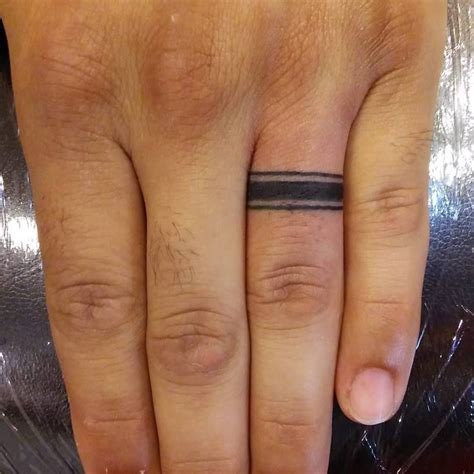 ring finger tattoos  men