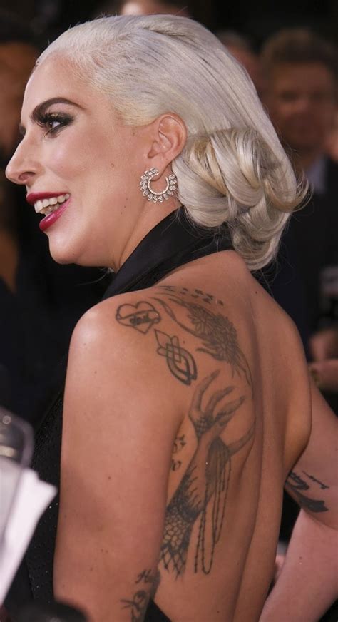 Lady Gaga's Hand-Turned-Monster Paw and Survivor Back Tattoos