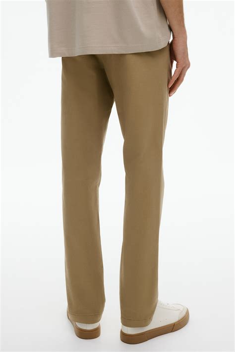 Baumwollchino in Slim Fit - Dunkelbeige - Men | H&M AT