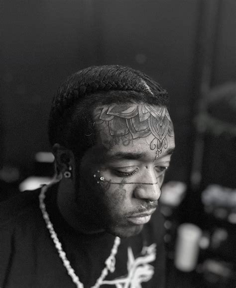 Lil Uzi Vert shows off new tattoos on forehead and tongue