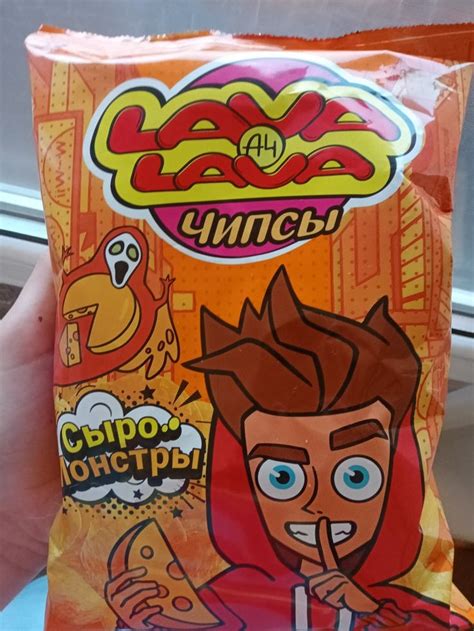 a person holding up a bag of chips