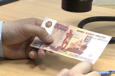 Как проверить деньги на подлинность: проверка денежных купюр на ...