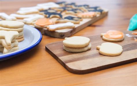 Premium Photo | Process of decorating cookies for halloween homemade pastry