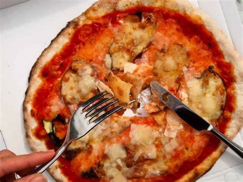 How Do Italians Eat Pizza? - Answers From A Large Italian Family - Eating Around Italy