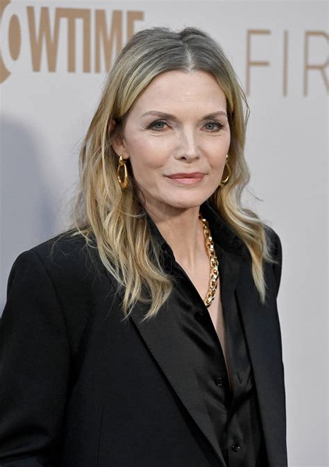 Download Stunning Michelle Pfeiffer In A Glamorous Pose Wallpaper
