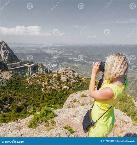 Female Traveler Enjoying the Views from the Mountains of Montserrat in