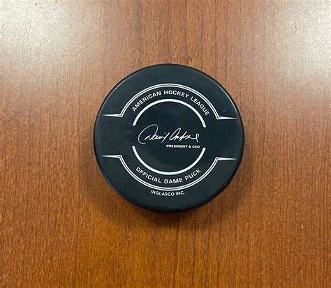 #64 Vladislav Kolyachonok Autographed Game Puck - 2020-21 – Syracuse