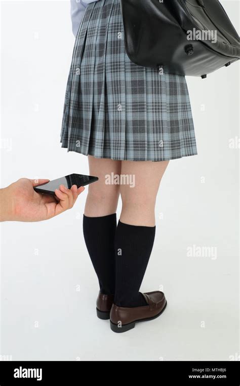 Upskirt photography social issue image Stock Photo - Alamy