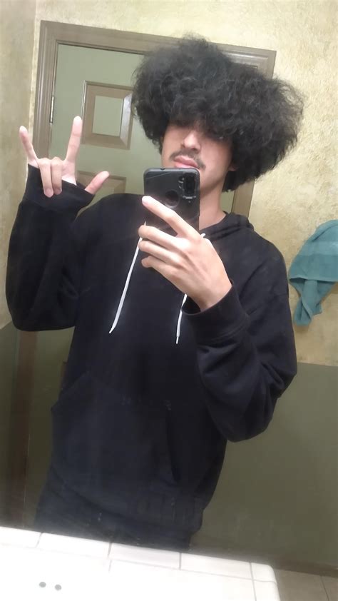 Somebody said I look like a Mexican emo with an afro. They're not wrong