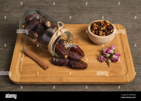 Date fruit ( Hurma ) spilled from the jar Stock Photo - Alamy