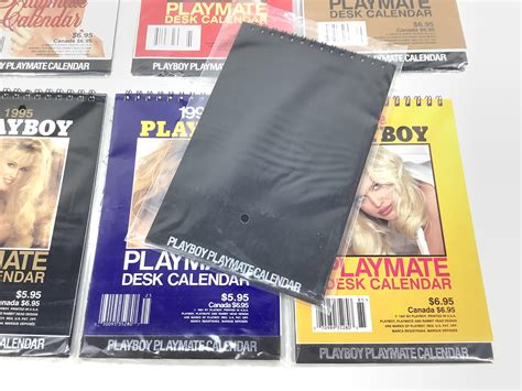 Lot - (9) 1990s Playboy Desk Calendars