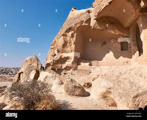 Remains of rock-cut christian temples at the rock site of Cappadocia near Goreme, Turkey. Fairy ...