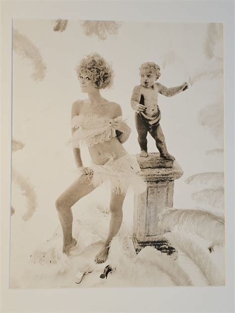 Nude, bar the feathers - barefoot with angel statue, authentic sixties