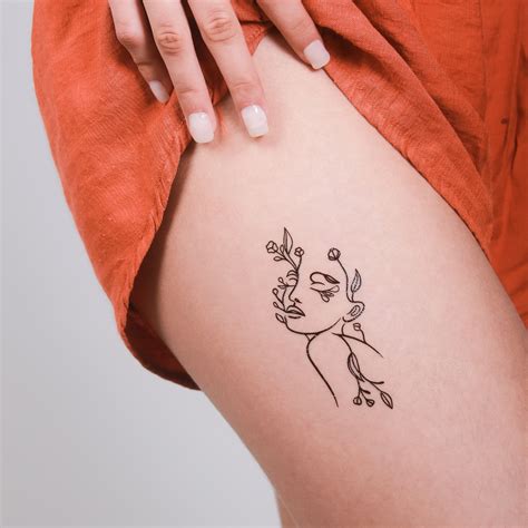 Flash Tattoo | Tatuaggio effimero unico con volto floreale – The Flash