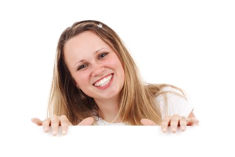Smiling Woman Behind Board Free Stock Photo - Public Domain Pictures