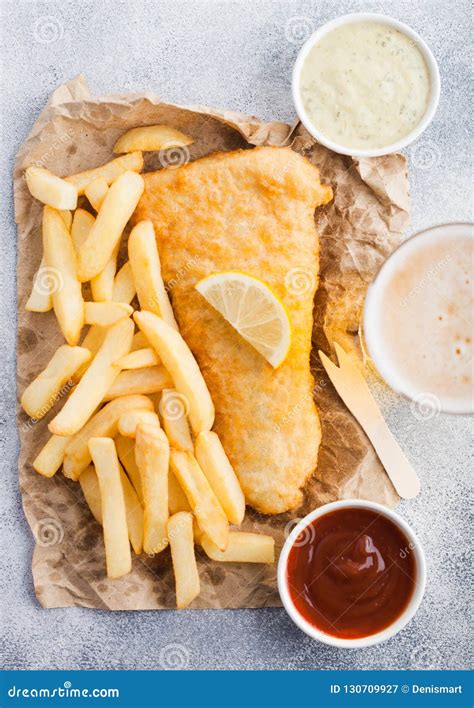 Traditional British Fish and Chips with Tartar Sauce Abd Glass of Craft ...