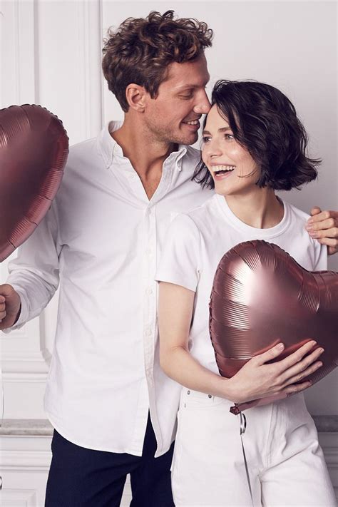 Actress Yulia Snigir in a white studio with heart balloons Yuliya ...
