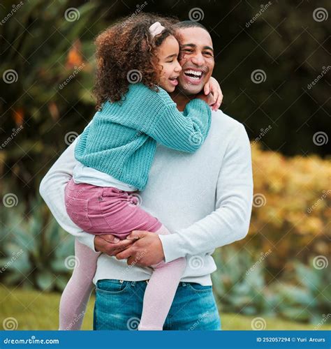 Shes a Daddys Girl and Dad Loves it. a Man Holding His Daughter while