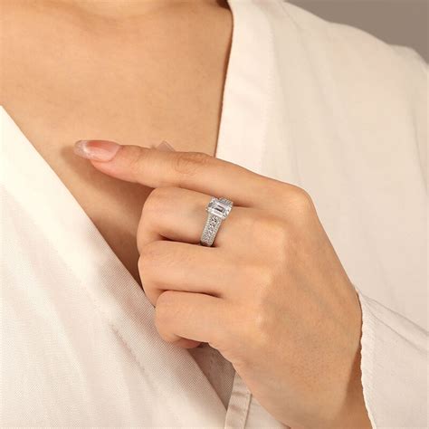 "Enchanted Love Story" Emerald Cut Side Stone Engagement Ring | She ...