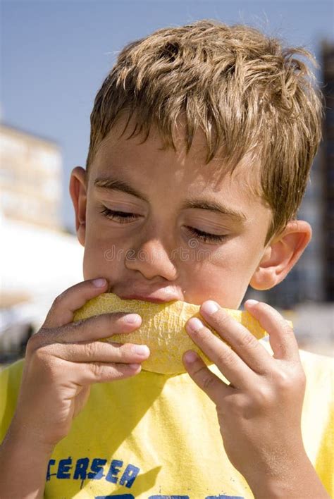 Boy eating melon stock photo. Image of hold, sand, melon - 2947320