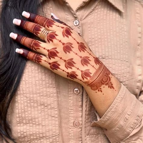 henna lotus flower hand  lotus mehndi designs  front