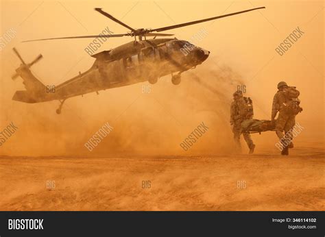 Army Soldiers Carrying Image & Photo (Free Trial) | Bigstock