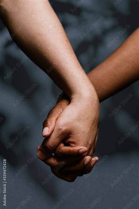 holding hands stock photo adobe stock