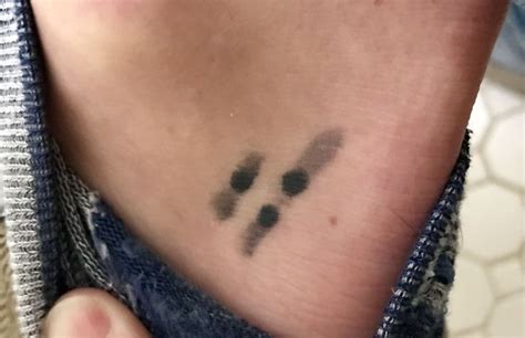 Inspiring Stories Behind Trisomy 21 Chromosome Tattoos - Hunter Games Magazine