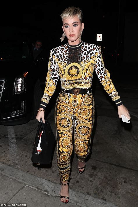 Katy Perry dons leopard print and gold two-piece in LA | Daily Mail Online