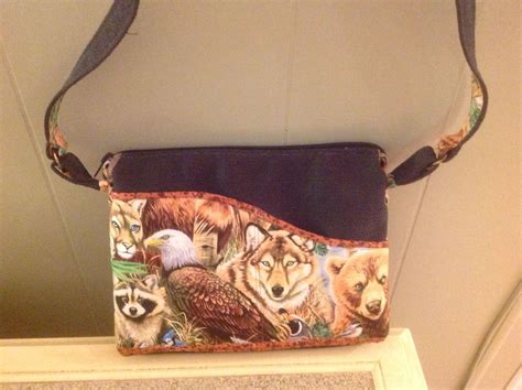 Black purse w Various wild Animals | Purses, Animal design, Handmade